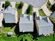Birds eye view of houses with manicured lawns and tree-lined streets in a quiet neighborhood at 2550 Trelipe Dr, Lawrenceville, GA 30044
