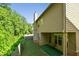 View of the backyard featuring a covered patio and fenced yard at 2550 Trelipe Dr, Lawrenceville, GA 30044