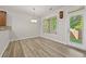 Dining area with natural light and a view to the backyard at 2550 Trelipe Dr, Lawrenceville, GA 30044