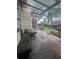 Relaxing covered porch with seating and view of backyard at 458 Vinings Vintage Cir, Mableton, GA 30126