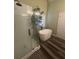 Bright bathroom featuring a shower, a tub and a window at 458 Vinings Vintage Cir, Mableton, GA 30126