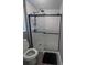 Modern bathroom featuring a large glass shower with a rainfall shower head at 458 Vinings Vintage Cir, Mableton, GA 30126