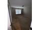 Neutral bedroom featuring large window, beige carpet, and neutral paint at 458 Vinings Vintage Cir, Mableton, GA 30126