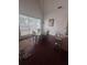 Bright dining area featuring natural light, elegant table and chairs, and hardwood floors at 458 Vinings Vintage Cir, Mableton, GA 30126