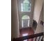 View of the front door, foyer with high ceiling and large windows letting in lots of natural light at 458 Vinings Vintage Cir, Mableton, GA 30126