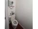 Charming half bathroom with decorative shelving and elegant accents at 458 Vinings Vintage Cir, Mableton, GA 30126