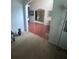 Inviting hallway featuring archway views into the dining room with elegant decor and a warm, welcoming ambiance at 458 Vinings Vintage Cir, Mableton, GA 30126