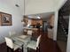Dining area and kitchen featuring stainless steel appliances and eat in breakfast bar at 458 Vinings Vintage Cir, Mableton, GA 30126