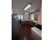 Kitchen featuring stainless steel appliances and light wooden cabinets at 458 Vinings Vintage Cir, Mableton, GA 30126