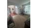 Inviting living room with home office space and natural light at 458 Vinings Vintage Cir, Mableton, GA 30126