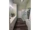 Elegant bathroom featuring a freestanding tub, walk-in shower, and modern vanity at 458 Vinings Vintage Cir, Mableton, GA 30126