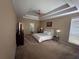 Spacious main bedroom featuring a tray ceiling and large windows at 458 Vinings Vintage Cir, Mableton, GA 30126