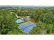 Aerial view of community amenities, including tennis courts and swimming pool at 528 Savannah Rose Way, Lawrenceville, GA 30045