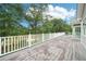 Spacious deck overlooking a beautiful pond surrounded by mature trees, perfect for relaxing and entertaining at 528 Savannah Rose Way, Lawrenceville, GA 30045