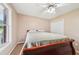 Bedroom with cozy carpet and a large window at 528 Savannah Rose Way, Lawrenceville, GA 30045