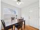 Cozy dining area with hardwood floors and backyard view at 528 Savannah Rose Way, Lawrenceville, GA 30045