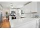 Updated kitchen with white cabinets, stainless appliances, and quartz countertops at 528 Savannah Rose Way, Lawrenceville, GA 30045