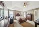 Spacious main bedroom featuring tray ceilings and ample natural light at 528 Savannah Rose Way, Lawrenceville, GA 30045