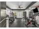 Home gym featuring state-of-the-art exercise equipment and mirrored walls at 5605 Copper Creek Pass, Cumming, GA 30040