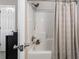 This bathroom features a shower over the tub and neutral walls at 735 Ponce De Leon Pl Ne Unit 1, Atlanta, GA 30306