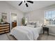 Cozy bedroom with bright windows and ensuite bathroom, offering a private and comfortable retreat at 735 Ponce De Leon Pl Ne Unit 1, Atlanta, GA 30306