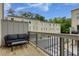 Balcony with a black couch, and a view of the townhouses at 302 Boxwood Ln, Roswell, GA 30075