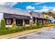 Street view of local businesses showcasing Vinings Gallery and Canton Street at 302 Boxwood Ln, Roswell, GA 30075