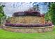 Stone community sign for Providence Harbor with colorful landscaping and lush green grass at 332 Warwick Pl, Mcdonough, GA 30253