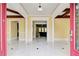 Open entryway with a view through to the living room and an adjacent kitchen at 332 Warwick Pl, Mcdonough, GA 30253
