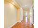 The home's hallway features hardwood floors, recessed lighting, and neutral walls at 332 Warwick Pl, Mcdonough, GA 30253