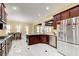Bright, spacious kitchen with stainless steel appliances, granite countertops, and breakfast nook with dining table at 332 Warwick Pl, Mcdonough, GA 30253