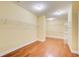 Spacious walk-in closet with neutral paint and white shelving, perfect for maximum storage, features hardwood floors at 332 Warwick Pl, Mcdonough, GA 30253