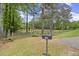 Inviting front entrance with a mailbox, featuring a charming fence and well-manicured landscaping at 3630 Spot Rd, Cumming, GA 30040