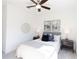 Bright bedroom with queen bed, side tables, and modern wall art at 5448 Howington E Ct # 194, Buford, GA 30518