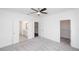 Spacious bedroom with an open closet and bathroom access, featuring neutral carpet at 5448 Howington E Ct # 194, Buford, GA 30518