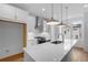 Modern kitchen with stainless steel appliances and white cabinetry, perfect for cooking and entertaining at 5448 Howington E Ct # 194, Buford, GA 30518