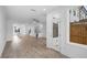 Open-concept living space with hardwood floors and plenty of natural light at 5448 Howington E Ct # 194, Buford, GA 30518