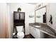 Bathroom with granite countertop, neutral colors, vanity with storage, and shower at 800 Peachtree Ne St # 8531, Atlanta, GA 30308