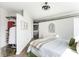 Spacious bedroom featuring a large closet, modern ceiling fan, and neutral decor at 800 Peachtree Ne St # 8531, Atlanta, GA 30308