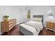 Bright bedroom featuring hardwood floors and modern furnishings at 1100 Carrington Pkwy, Villa Rica, GA 30180