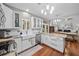 Beautifully updated kitchen with white cabinets, granite counters and an island at 1100 Carrington Pkwy, Villa Rica, GA 30180