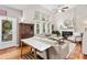 Bright living room with hardwood floors, fireplace, and large windows at 1100 Carrington Pkwy, Villa Rica, GA 30180