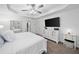 Bright main bedroom with ceiling fan, and white dresser at 1100 Carrington Pkwy, Villa Rica, GA 30180