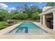 Stunning in-ground pool with a spa and well-maintained concrete patio, perfect for relaxation and outdoor enjoyment at 1100 Carrington Pkwy, Villa Rica, GA 30180