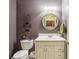 Well-lit bathroom with vanity, toilet, and decorative accents at 1386 Sheffield Glen Ne Way, Atlanta, GA 30329
