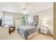 Bright bedroom featuring neutral walls, white furniture, ceiling fan, and comfortable furnishings at 1386 Sheffield Glen Ne Way, Atlanta, GA 30329