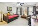 Bedroom and office combination featuring carpet floors and natural light at 1386 Sheffield Glen Ne Way, Atlanta, GA 30329