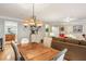 Living and dining area featuring hardwood floors and plenty of natural light at 1386 Sheffield Glen Ne Way, Atlanta, GA 30329