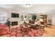 Inviting living room with fireplace, hardwood floors, and comfortable seating at 1386 Sheffield Glen Ne Way, Atlanta, GA 30329