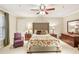 Inviting main bedroom with tufted headboard, and window at 1386 Sheffield Glen Ne Way, Atlanta, GA 30329